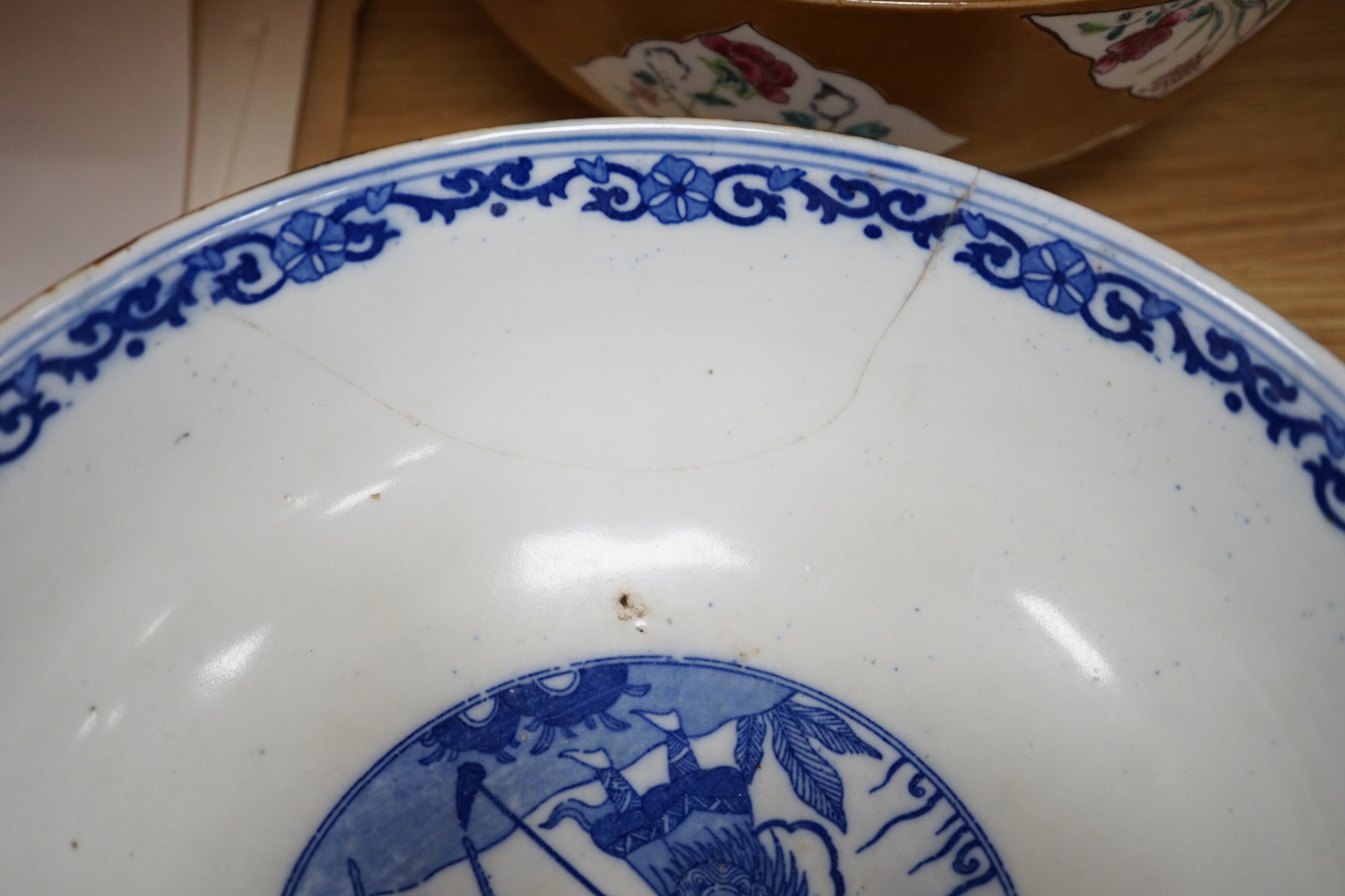 A group of Japanese and Chinese ceramics to include two blue and white jars, a wucai bowl etc.